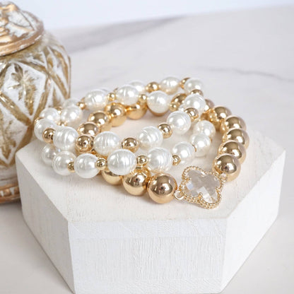 Conjunto de pulseras llamativas con cuentas gruesas y dije de trébol: elegantes y atrevidas