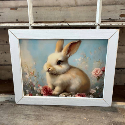 Conejito de Pascua en un campo floral